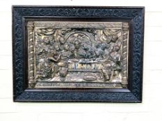 An antique framed pressed white metal study of the last supper