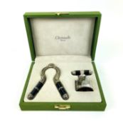 A cased French Christofle Champagne bottle opener and stopper