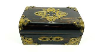 A 19th century coromandel table box with decorative brass mounts throughout