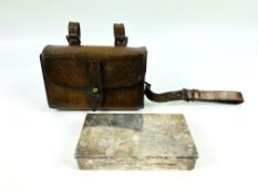 An early 20th century leather cased Saddlers silver plated sandwich tin