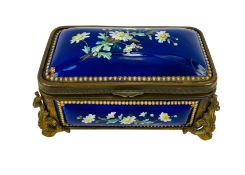 A late 19th century French decorative ormolu mounted musical jewellery box