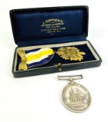 A George V Royal Navy long service and good conduct; together with a hallmarked Masonic medal