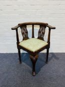 One of a pair, a 19th century oak framed corner chair