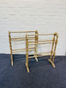 A pair of solid beech towel rails