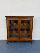 A good quality Edwardian solid walnut bookcase
