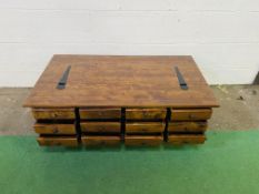 A large contemporary hardwood coffee table