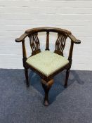 One of a pair, a 19th century oak framed corner chair
