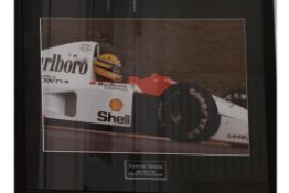 A Large Photographic Image of Ayrton Senna at the Wheel of His McLaren