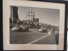 Multi-Signed Monochrome Image of Sir Stirling Moss Winning the 1955 British Grand Prix at Aintree
