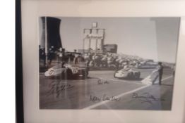 Sir Stirling Moss Takes the Chequered Flag at Aintree in 1955 Signed by Moss and Others