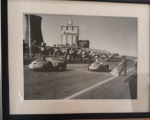 Multi-Signed Monochrome Image of Sir Stirling Moss Winning the 1955 British Grand Prix at Aintree