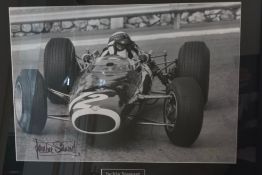 Large Monochrome Signed Image of Sir Jackie Stewart at the Wheel of his 1966 BRM 