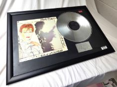 1 x Framed DAVID BOWIE Silver 12 Inch Vinyl Record - SCARY MONSTERS - Mounted and Framed