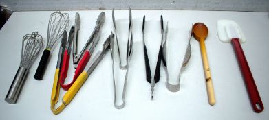 11 x Assorted Cooking/Serving Utensils Including Tongs & Whisks