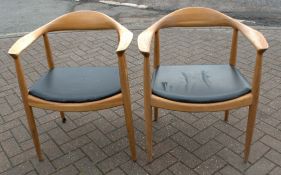 2 x Light Wood Dining Chairs With Black Cushioned Seats
