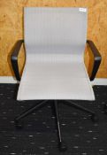 1 x Vitra Office Swivel Chair on Castors - Featurs a Light Grey Seat with Black Frame, Armrests and