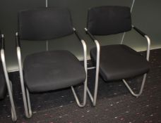4 x Stackable Cantilever Office Meeting Chairs Featuring Hardwearing Black Fabric, Silver Frames and