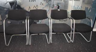 4 x Stackable Office Meeting Chairs Featuring Hardwearing Black Fabric, Silver Frames and Armrests