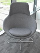 1 x Contemporary Armchair Upholstered in a Grey Fabric