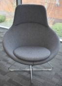 1 x Contemporary Armchair Upholstered in a Grey Fabric