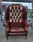 1 x Chesterfield Wingback Armchair Upholstered in Oxblood Red Leather