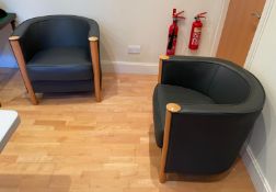 2 x Tub Chairs Featuring a French Navy Leather Upholstery and Maple Wood Detail
