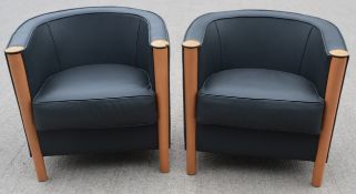 2 x Tub Chairs Featuring a French Navy Leather Upholstery and Maple Wood Detail
