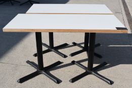 2 x Restaurant Dining Tables Featuring White Tops and Cast Iron Bases - CL694 - Ref: WAH128 -
