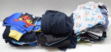 40 x Assorted Items of Boys Casual Clothing Including Pajamas, Shorts and Joggers - Ages Vary 5-10 -