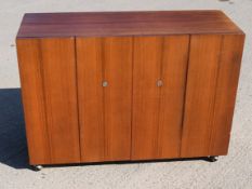 1 x Vintage Scandinavian Sideboard Featuring Bifold Lockable Doors and Ball Castor Feet