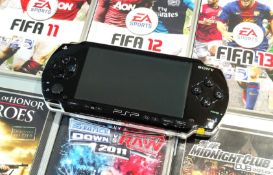 1 x Retro SONY PSP Handheld Games Console Featuring 6 x Games, Original Charger and Protective Cases