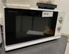 1 x Collection of Kitchen Appliances Including a Sharp Microwave Oven and a Breville Kettle and Toas