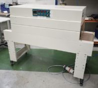 1 x Fully Automatic Heat Shrink Packaging Machine - 400v - Dimensions: H75/120 x W150 x D60 cms