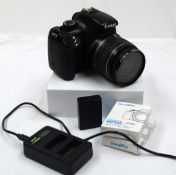 1 x Canon EOS 1100D Digital DSLR Camera - Includes Three Batteries and Charger