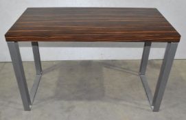 1 x Contemporary Rectangular Table Featuring a Macassar Ebony Finish and Heavy Duty Steel Bases