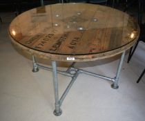 1 x Large Round Dining Table Feautring an Industrial Barrel Top with Glass Protector and Industrial
