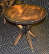 1 x Restaurant Dining Table Featuring a Distressed Round Table Surface Supported by a Wooden Star
