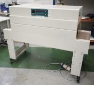 1 x Fully Automatic Heat Shrink Packaging Machine - 400v - Dimensions: H75/120 x W150 x D60 cms