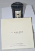 1 x JO MALONE LONDON Myrrh & Tonka Scented Travel Candle (60g) + a Peony & Blush Car Diffuser refill