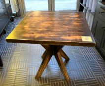 1 x Restaurant Dining Table Featuring a Distressed Table Suface Supported by a Wooden Star Base
