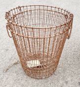 A Pair of Decorative Wire Storage / Log Baskets with a Copper Finish - Ex-Showroom Display