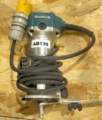 1 x Makita RT0700C Router - 710W, 110V - Adjustable Speed of 10,000-30,000 RPM - Collet size 1/4