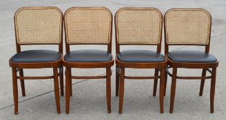 4 x Bourne Walnut Japani Dining Chairs Featuring Black Seat Pads and Natural Cane Backrests