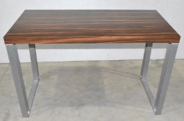 1 x Contemporary Rectangular Table Featuring a Macassar Ebony Finish and Heavy Duty Steel Bases -