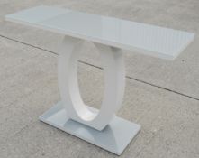 1 x Sophisticated Grey Glass Topped Console Table featuring a Halo Base and White High Gloss