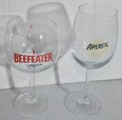2 x Boxes of 12 x Beefeater Gin and Tonic Glasses and 12 x Aperol Wine Glasses - Unused Boxed