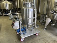 Isobaric Hop Injector on wheeled skid and attached mono pump