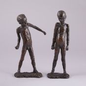Artist of the 20th century- Two children - bronze. Brown patina. H. 25,3 cm. and 27 cm. Unsigned.