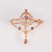 Brosche/ Anhänger mit Brillanten und Granat 585