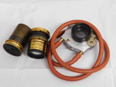 Three lenses: to include a French brass lens by Clement & Gilmer No. 102412, 5x4 Rapid Symetrical;